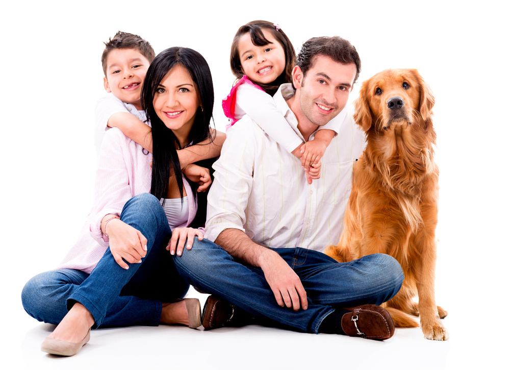 Happy family with a dog - isolated over a white background
